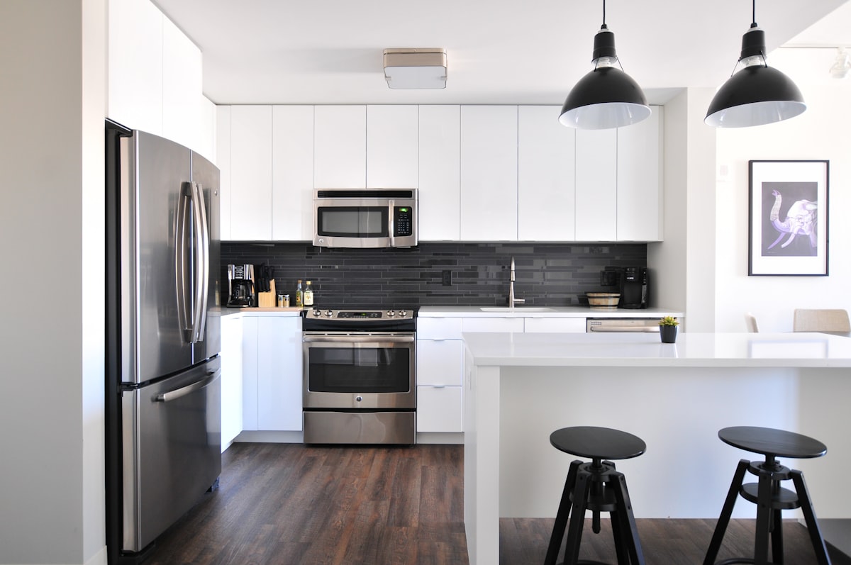 Renovated kitchen with natural light and timber details
